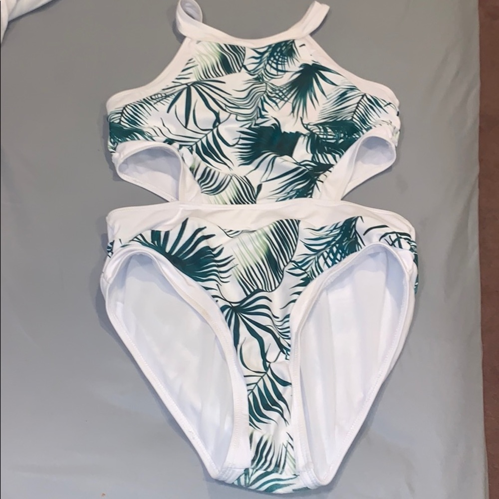 One piece swim suit open back and sides